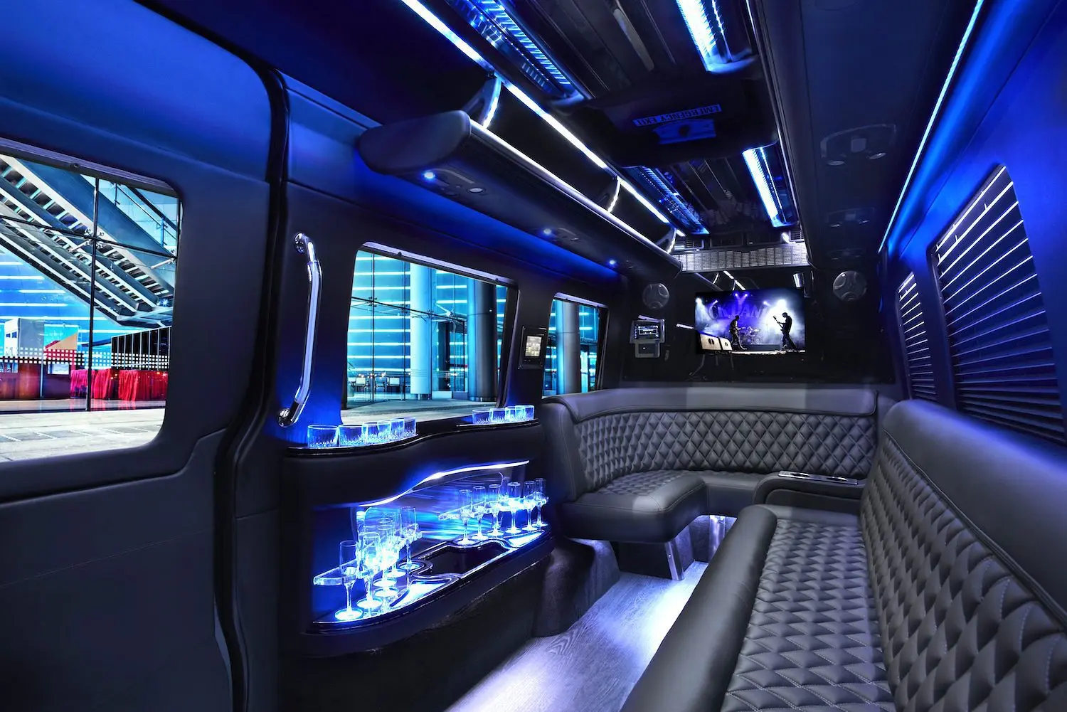 A very nice looking limo with blue lights.