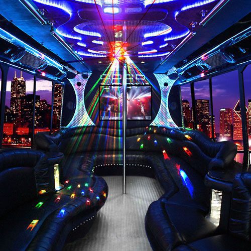 A party bus with lights and many seats
