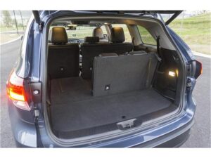 A car with the trunk open and seats folded down.