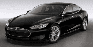 A black tesla car is parked in the parking lot.