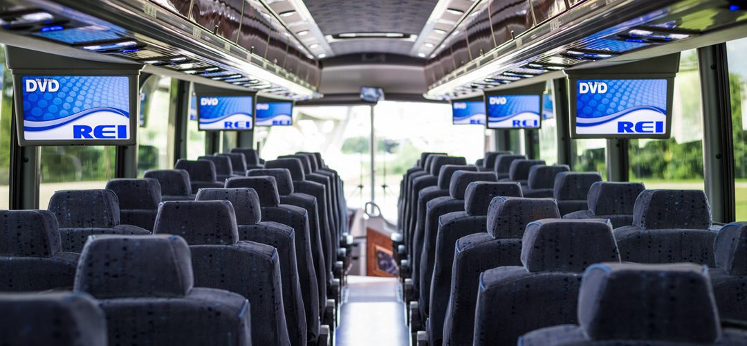 A large bus with many seats in it