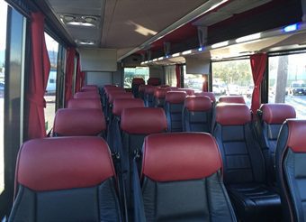 A bus with many seats in it