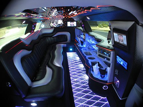 A limo is shown with its seats in the back.