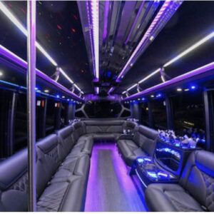 A bus with purple lights and leather seats.