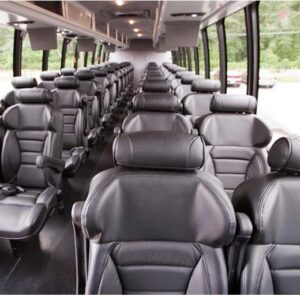 A large bus with many seats in it