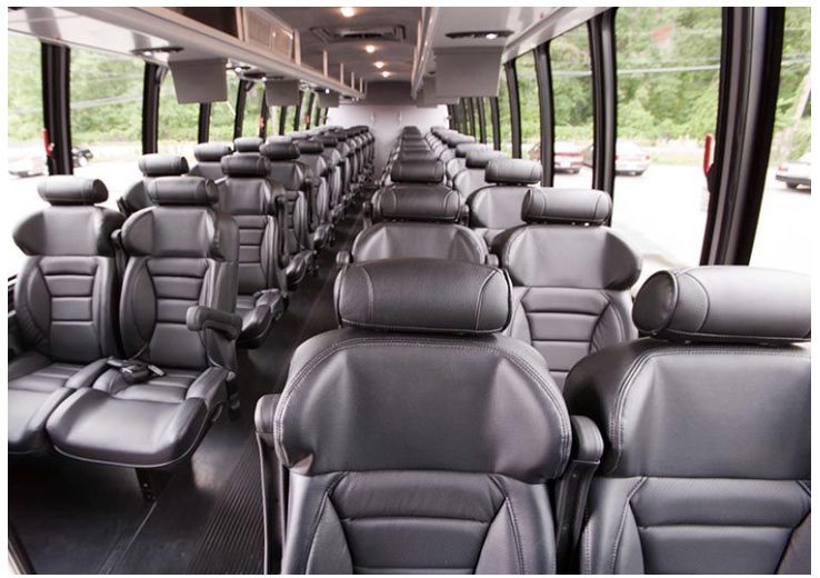 A large bus with many seats in it