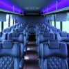 A large bus with many seats in it