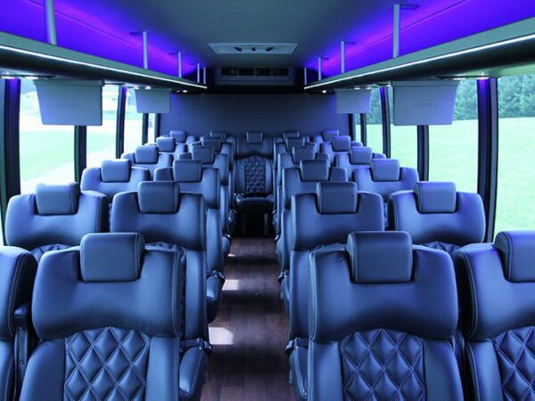 A large bus with many seats in it