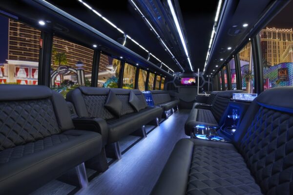 A bus with many seats and lights on the side.