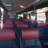 A bus with many seats in it