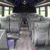 A large bus with many seats in it