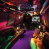 A party bus with purple carpet and lights