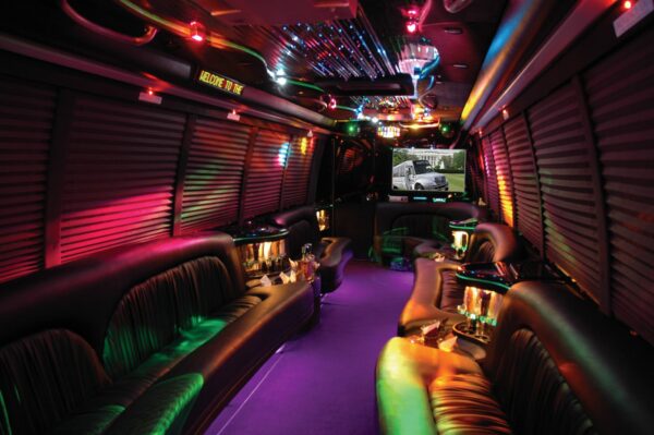 A party bus with purple carpet and lights