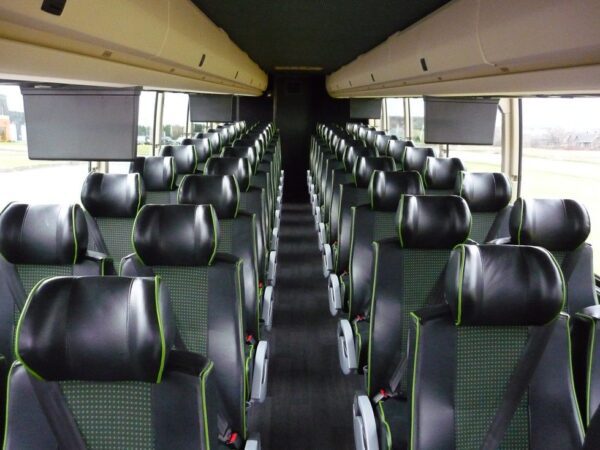 A bus with many seats in it