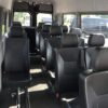 A bus with many seats in it