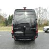 A black van parked in the parking lot