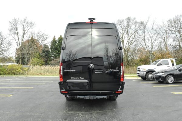 A black van parked in the parking lot