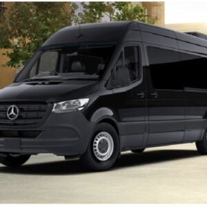 A black mercedes benz van parked in front of a building.