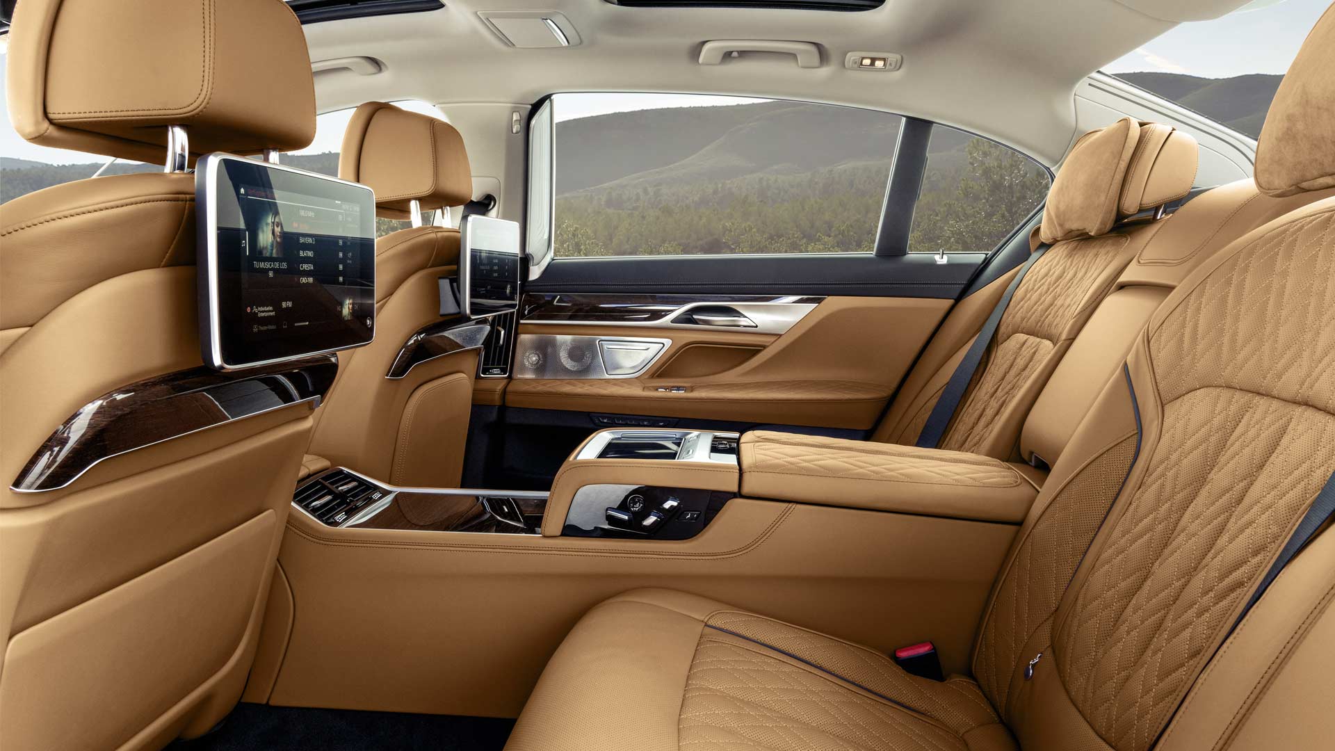 A car with tan leather seats and a brown door.