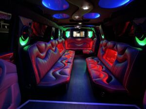 A very nice looking limo with red and blue lighting.