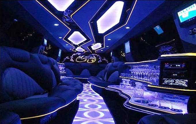 A blue limo with lights on the ceiling