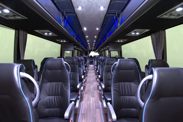 A large bus with many seats in it