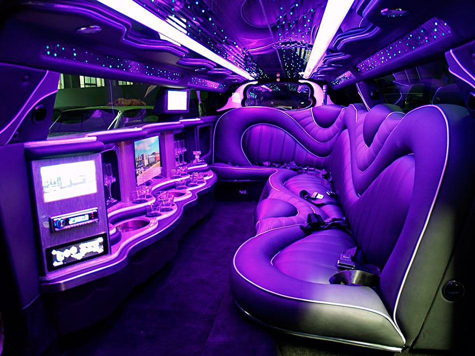 A purple limo with the seats folded down.