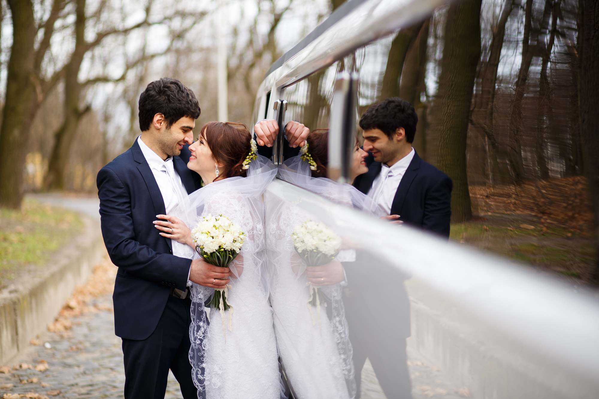 A man and woman standing next to each other.